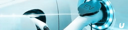 An electric vehicle getting charged.